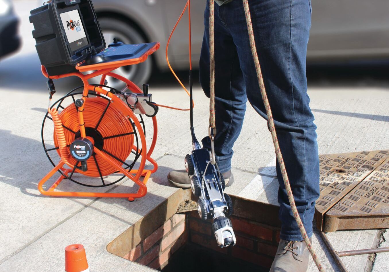 image of man using pipeline inspection equipment